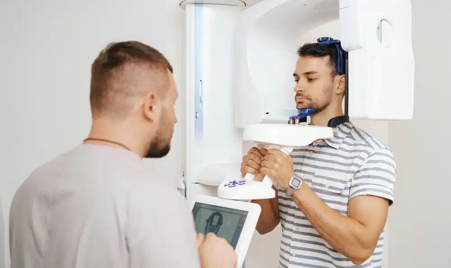 What to expect CBCT scan - patient positioned in a modern cone beam CT scanner at 3Beam Imaging Centre Harley Street